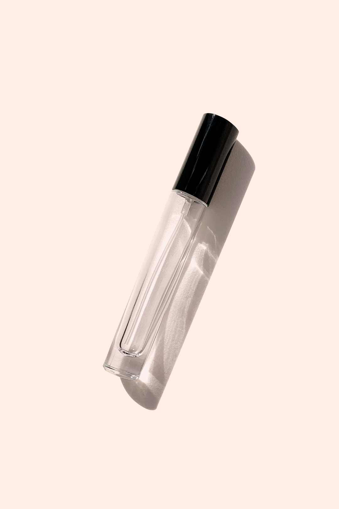 Empty glass perfume spray bottle